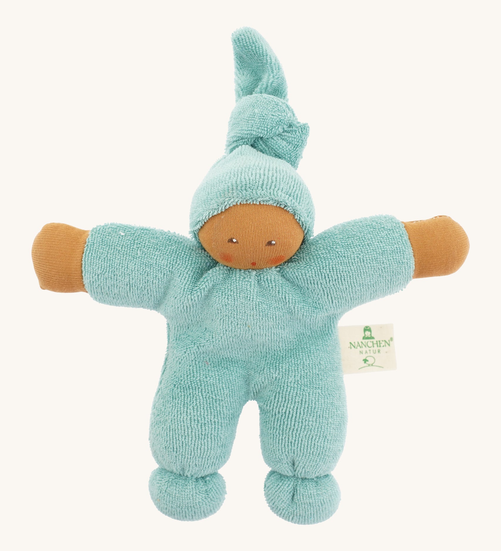 Full front view of the Nanchen Pimpel Doll in sage, made from organic cotton towelling and filled with organic wool. The doll features a brown-toned hand-painted face, outstretched arms, and a tall pointed hood tied at the top.
