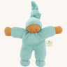 Full front view of the Nanchen Pimpel Doll in sage, made from organic cotton towelling and filled with organic wool. The doll features a brown-toned hand-painted face, outstretched arms, and a tall pointed hood tied at the top.
