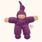 Nanchel pimpel waldorf doll in purple. Showing cute facial features and a tie on the hat. Doll has a terry cloth body 
