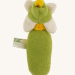 The back of the Nanchen Flower Rattle Doll - Daisy, is a soft, organic and handmade sensory doll toy with a green body, a little greet hat with white daisy leaves and a yellow strip of fabric to mimic hair. 