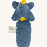 The back of the Nanchen Flower Rattle Doll - Forget-Me-Not, this is a soft, organic and handmade sensory doll toy with a blue body, a little blue hat with blue forget-me-not leaves and a yellow strip of fabric to mimic hair. This doll also has an adorable face with blue eyes