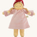 Nanchen Gardenchild Doll, Lolle is a beautiful handcrafted Waldorf doll toy. With a light pink dress, an adorable hand painted face with blue eyes, blonde hair in two braids each secured with red ribbons, and a red and white mushroom style hat. On a cream background