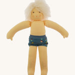 Nanchen Waldorf Doll - Lotte, an organic doll wearing blue pants.