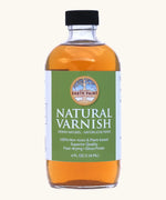 A 4oz bottle of the Natural Earth Paint natural varnish - enhances depth of color and protection 