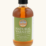 A 8oz bottle of the Natural Earth Paint natural varnish - enhances depth of color and protection 