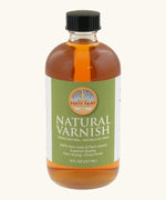 A 8oz bottle of the Natural Earth Paint natural varnish - enhances depth of color and protection 