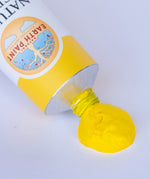 A close up of the brilliant yellow paint from Natural earth paint aluminium tube showing the consistency 
