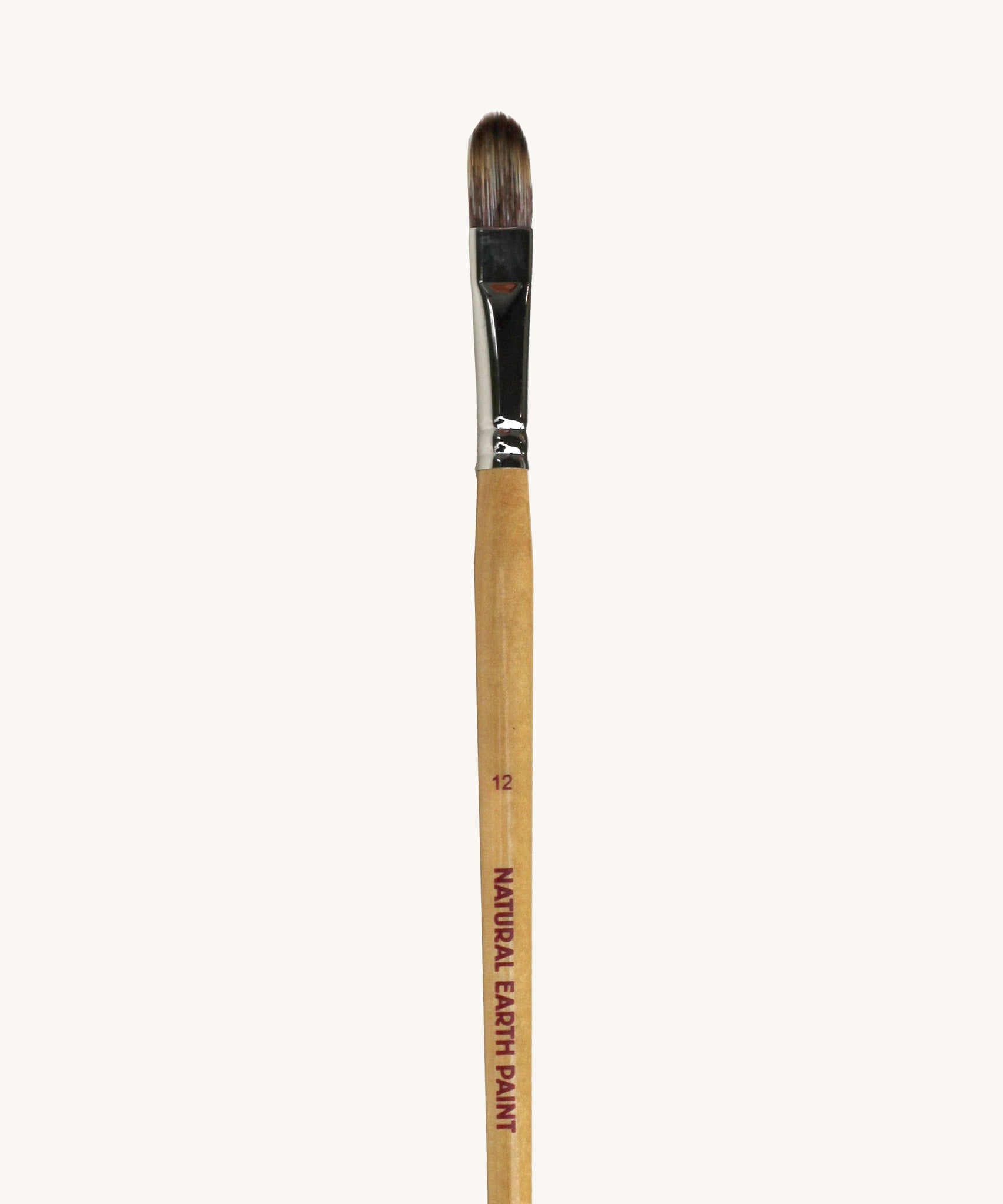 A close up view of the size 12 Natural Earth paint brush showing the wooden handle and brand name printed on the side