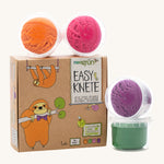 Neogrun modelling clay 4 pack features a green purple, pink and orange organic clay in small plastic tubs and comes in a cardboard box with a 2 playful sloths