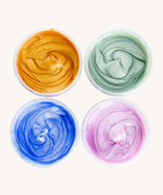 A top down view of the Neogrun crystal finger paint. Showing the consistency of the  4 coloured glitter style finger paint 