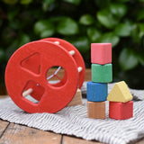Nic BIO red rolling shape sorter wooden toy with 6 wooden blocks. 