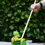 Nic Toys frog king push along toy. Green frog with yellow felt details and gold bell. 