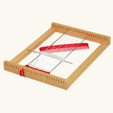 Nic Wooden Lotte Weaving Frame pictured with red and white yarn.