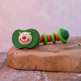 Nic apple worm baby wooden grasping toy. Smiling worm on a flexible rope lined with chunky red and green beads.
