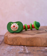 Nic apple worm baby wooden grasping toy. Smiling worm on a flexible rope lined with chunky red and green beads.