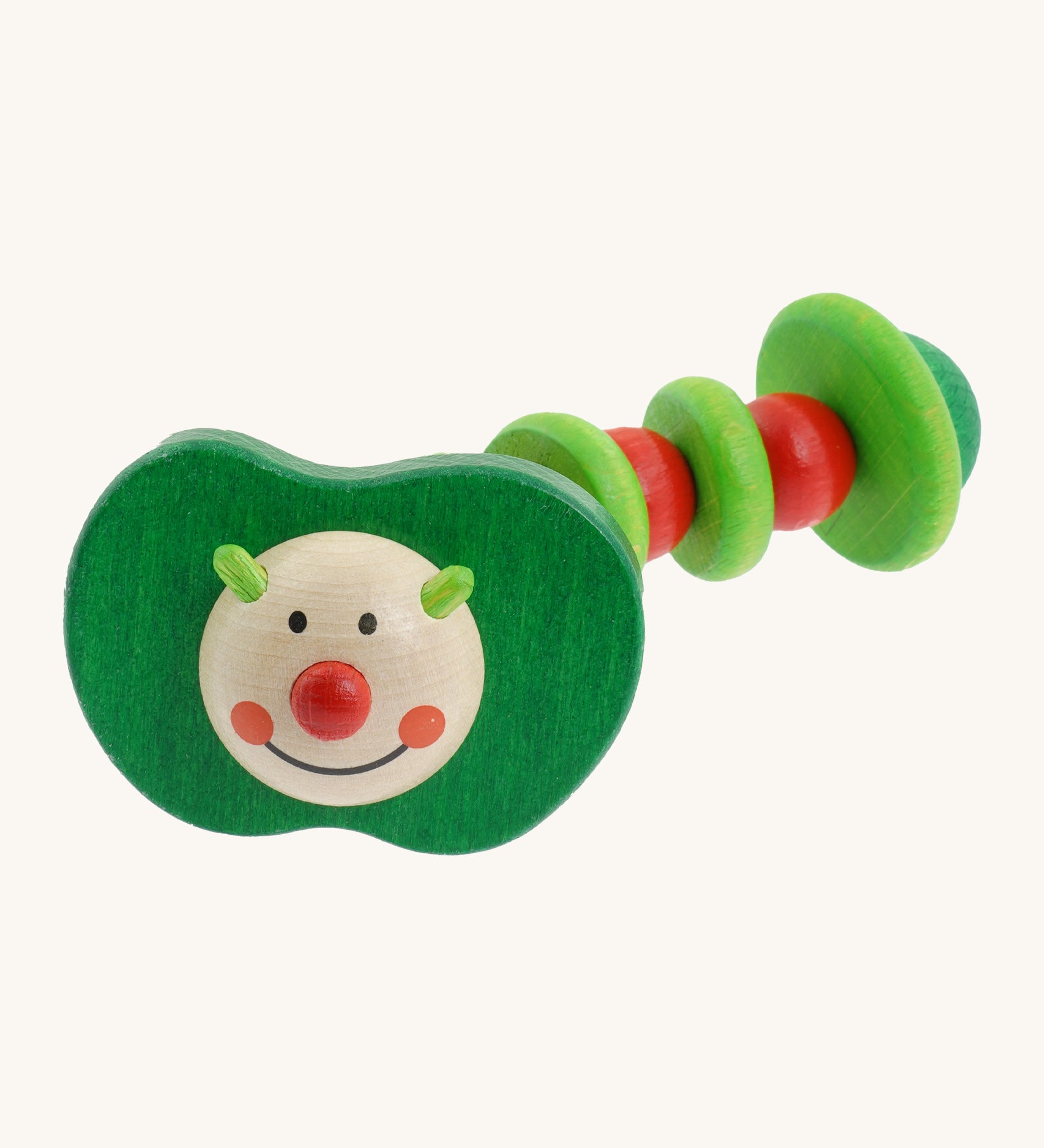 Nic Toys wooden apple worm grasper. Features a playful face with a green and red wriggly body 