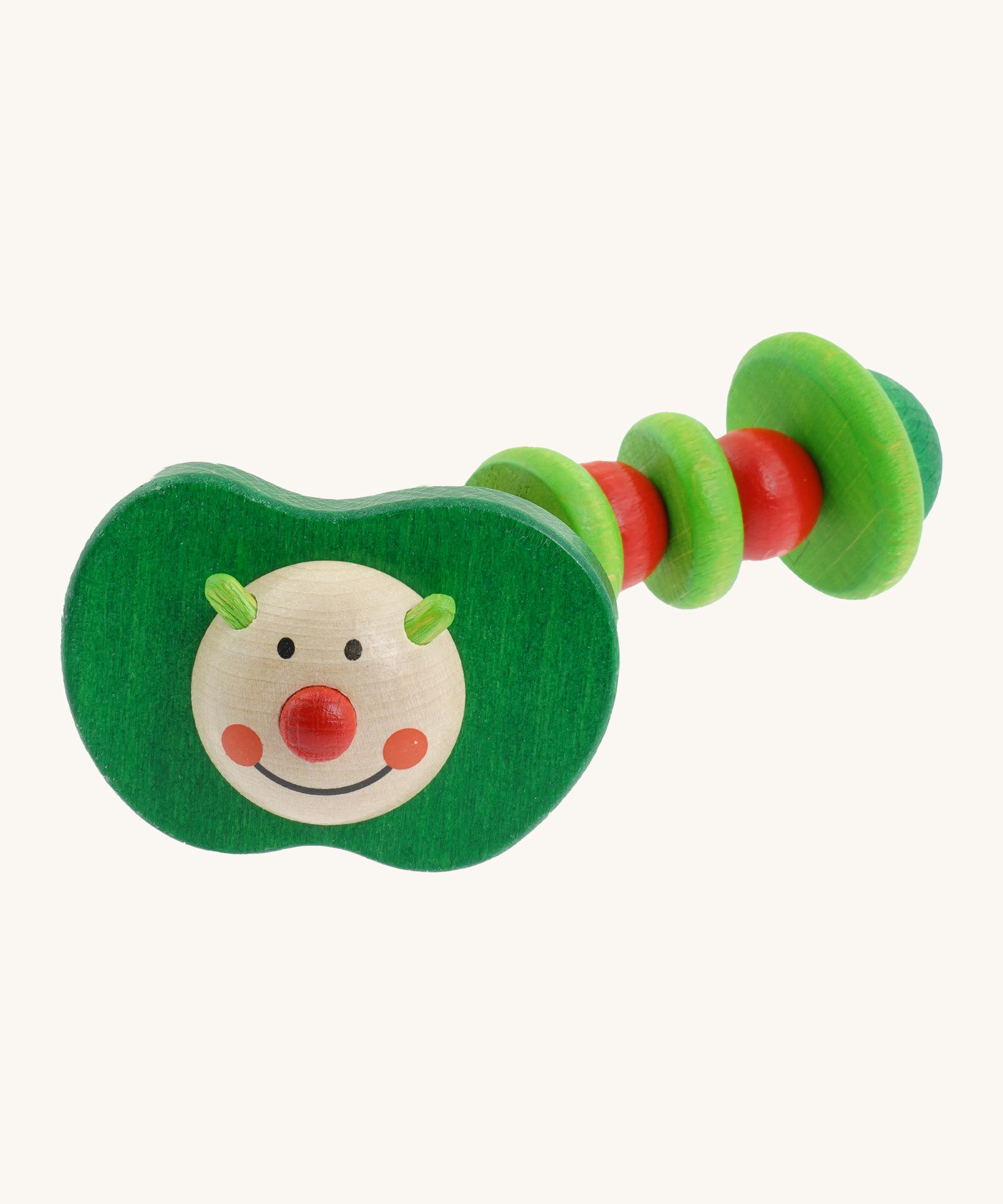 Nic Toys wooden apple worm grasper. Features a playful face with a green and red wriggly body 