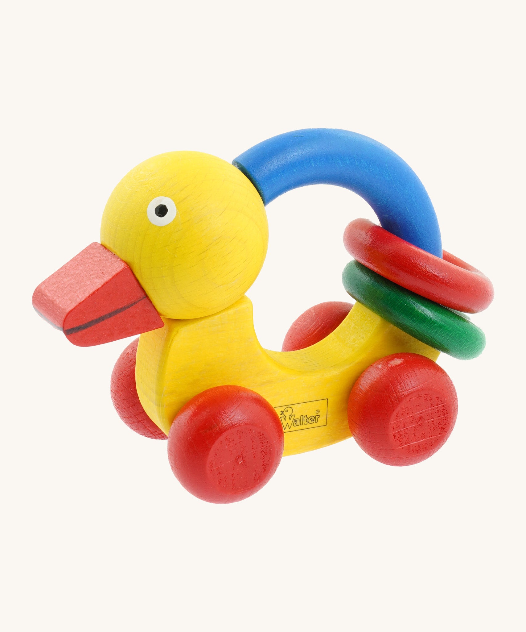 Nic Toys wooden grip duck in yellow with red wheels. Features a blue handle for grip with red and green rings for play 