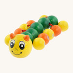 Nic Toys wooden molly the caterpillar grasping toy. Features a yellow and green body with grasping beads representing the feet.