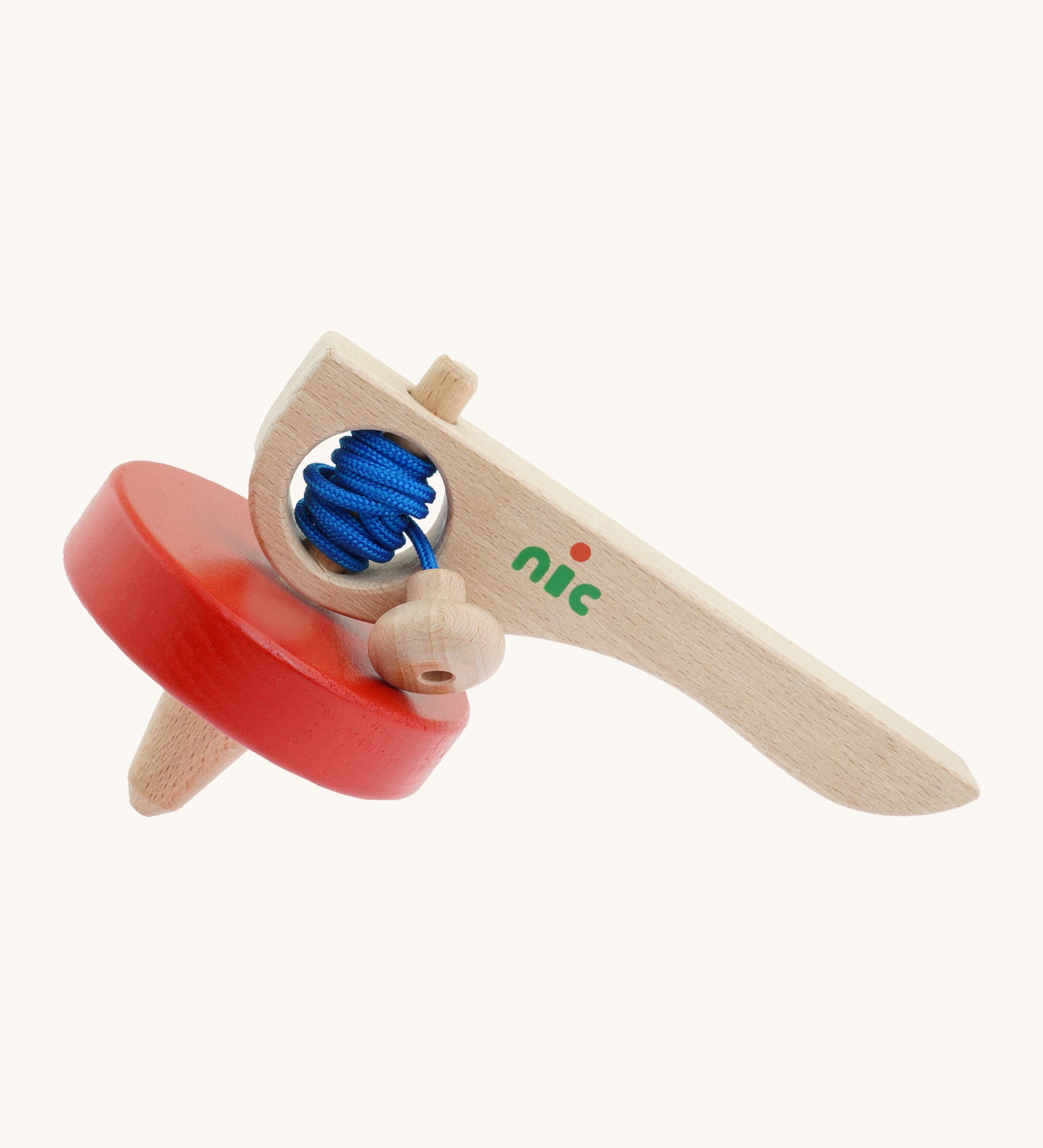 Nic Toys wooden red spinning top. Features a wooden handle for handling the spinner top with a blue cord for spinning the top. 