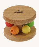 Nic Toys wooden rolling rattle laid flat, features multicoloured beads for grasping and brand name on the side disk