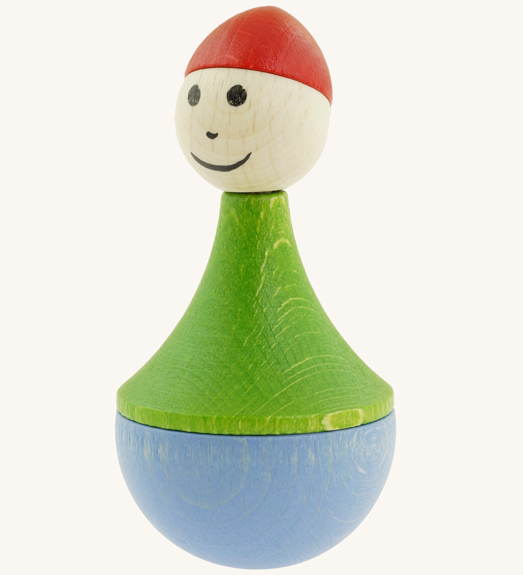 Nic toys wooden gnome tumbler available at Babipur. A weighted wooden toy with a green top, light blue bottom and a red hat. Features playful facial features