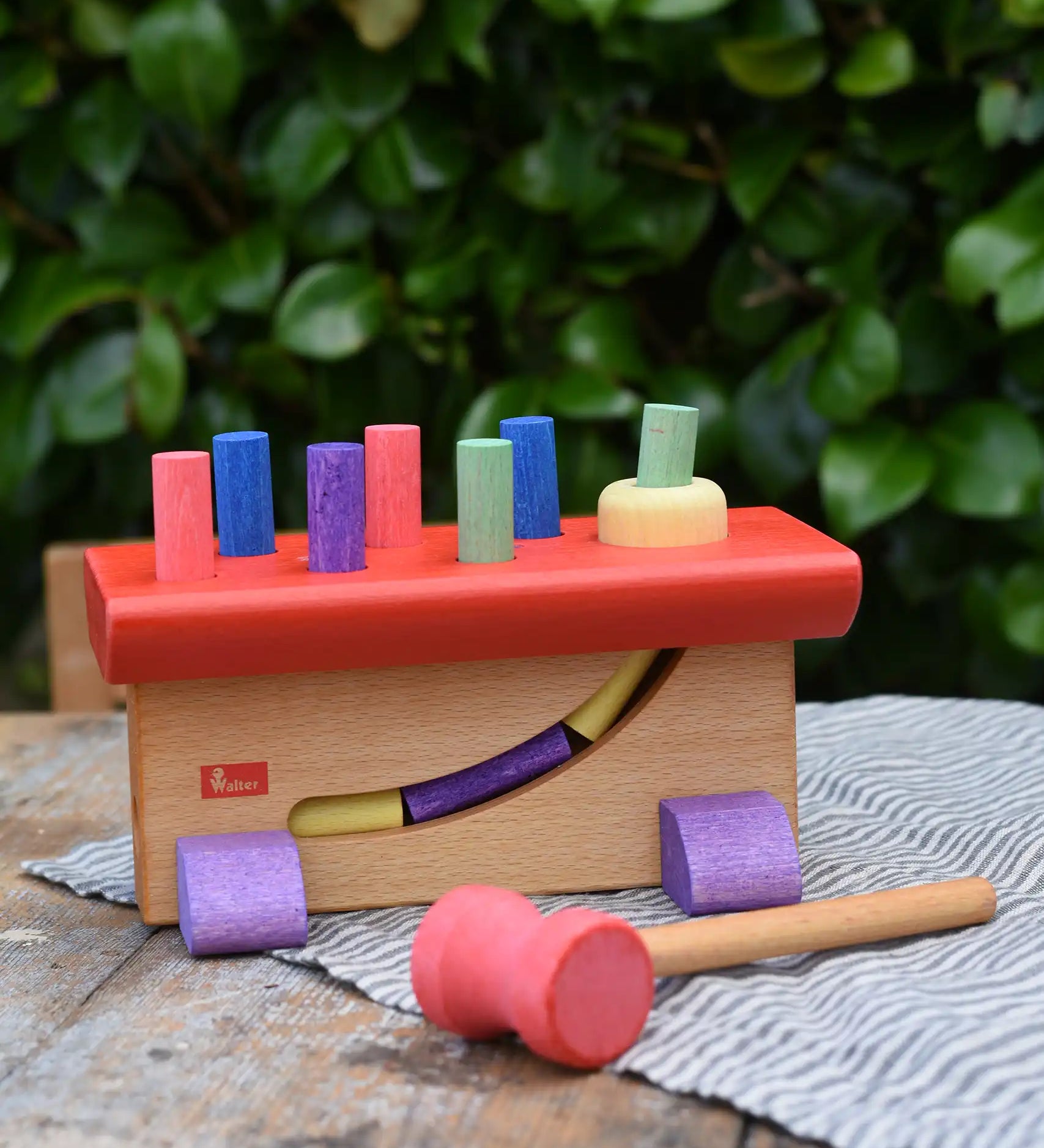 Nic Walter bio organic wooden pounding bench children's toy. Stained with natural pigments and dyes. 