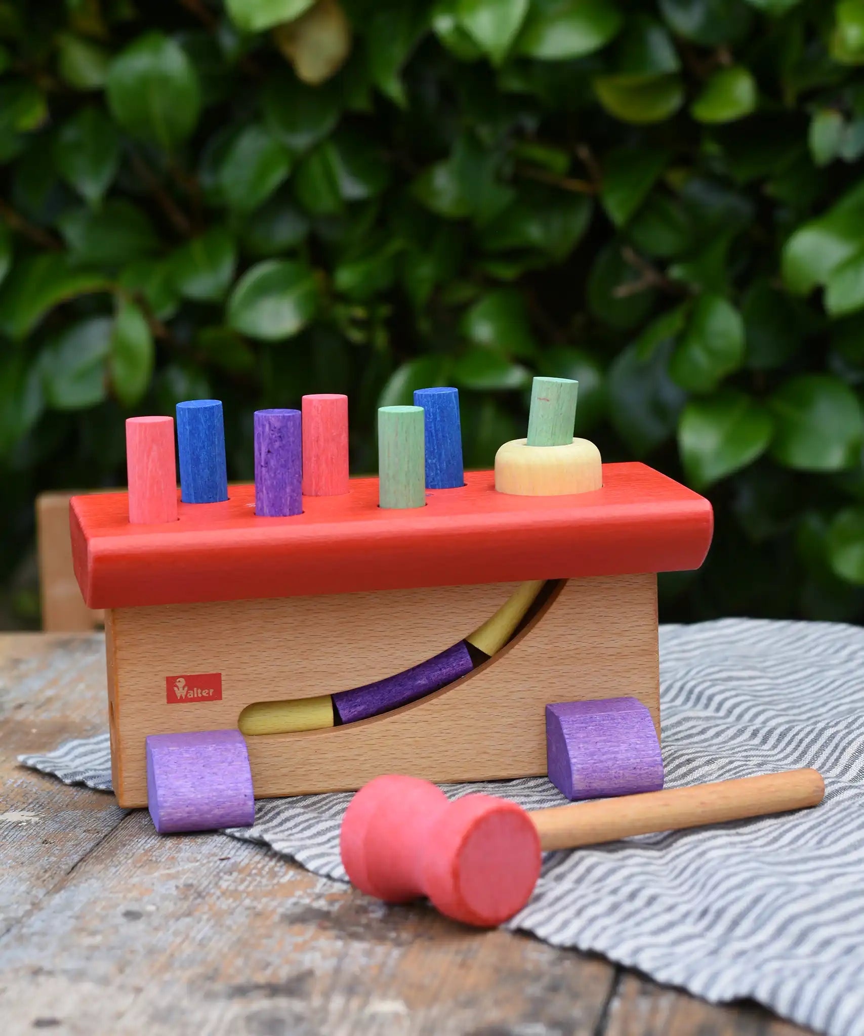 Nic Walter bio organic wooden pounding bench children's toy. Stained with natural pigments and dyes. 