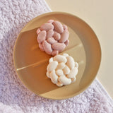 A person rubbing the Lamazuna Nourishing Dream Cream Bar