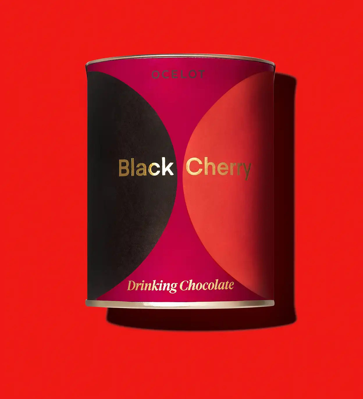 Ocelot Black Cherry Organic Drinking Chocolate. Chocolate flakes in a 200g tin.