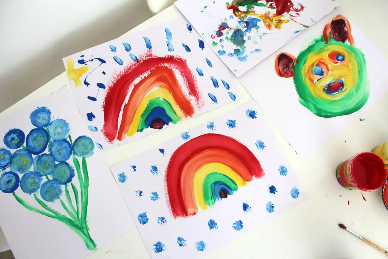 Children's paintings created using the Okonorm non-toxic finger paints. 