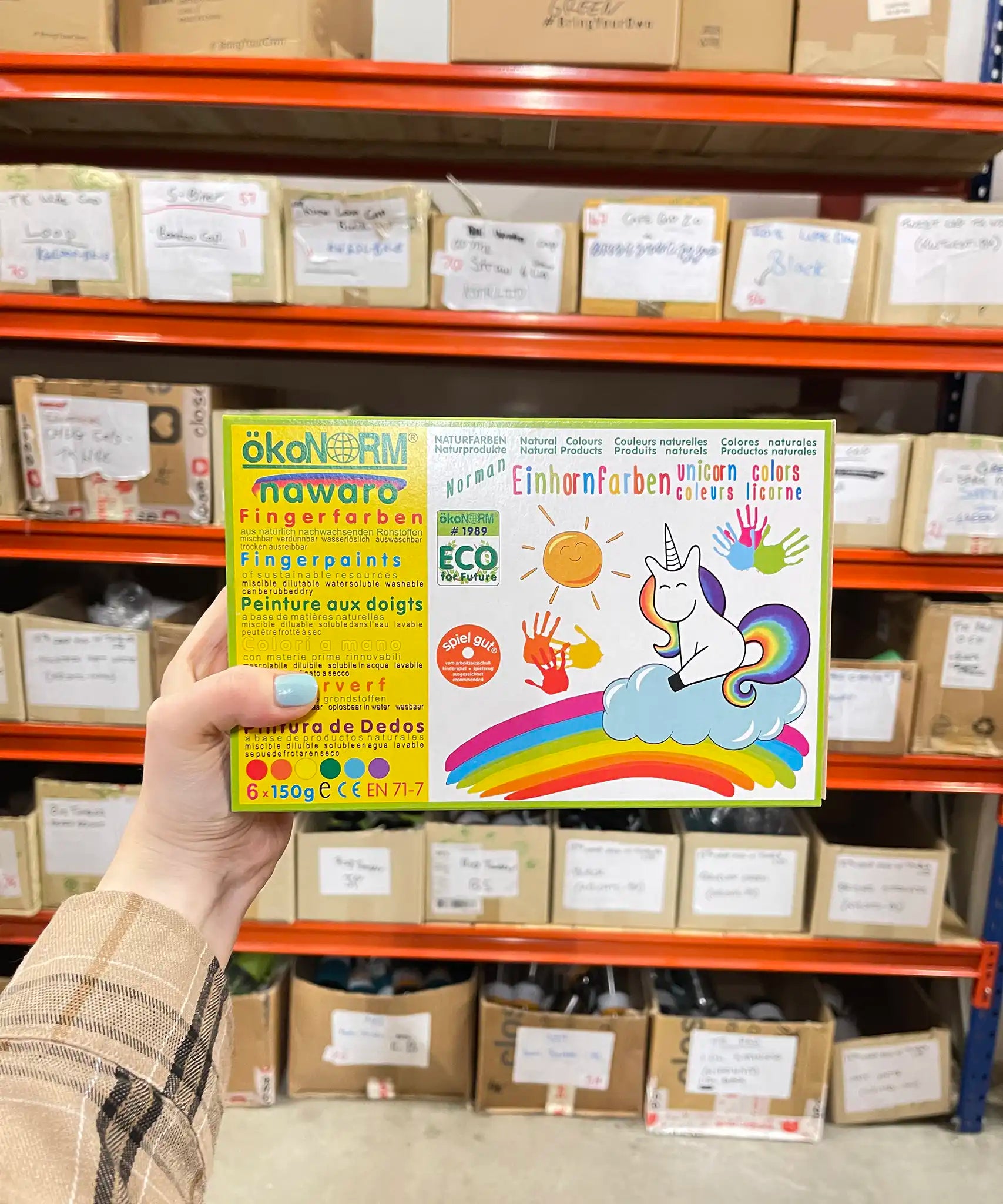 OkoNorm finger paints in 6 unicorn themed colours shown in the cardboard packaging box. 