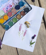 Watercolour bee and lavender painting created using the Okonorm 12 colour watercolour paints in a travel tin.