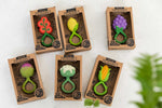 A collection of six Oli & Carol Teether toys pictured on a plain background