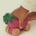  and wooden wheels on a cream background