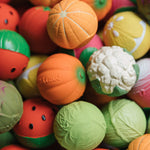 A collection of mixed fruit and vegetable Oli & Carol Baby Sensory Balls 