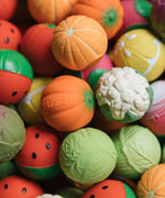 A collection of mixed fruit and vegetable Oli & Carol Baby Sensory Balls 