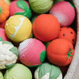 A collection of Oli & Carol fruit and vegetable baby sensory balls 