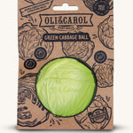 The Oli & Carol Natural Rubber Baby Ball - Green Cabbage in it's card packaging sleeve on a plain background.