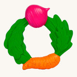 The Oli & Carol Natural Rubber Veggie Teething Ring on a plain background. 
