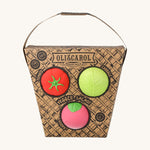 Oli & Carol Veggie Salad Baby Sensory Balls in their basket shaped cardboard packaging, a tomato, cabbage and a radish