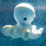 Orlando The Octopus bath toy by Oli&Carol in its cardboard box.
