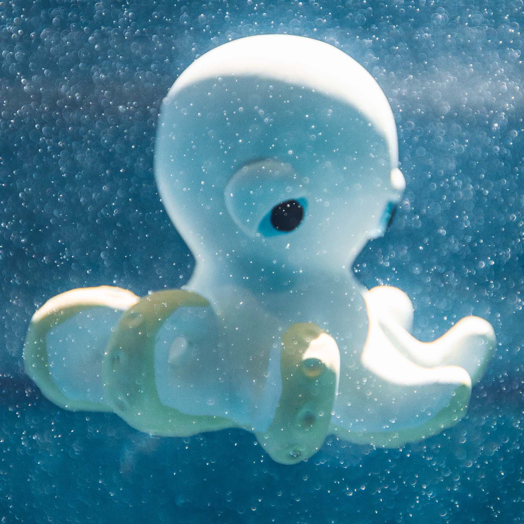 Orlando The Octopus bath toy by Oli&Carol in its cardboard box.