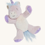A picture of the unicorn toy on its back, so that you can see its soft belly