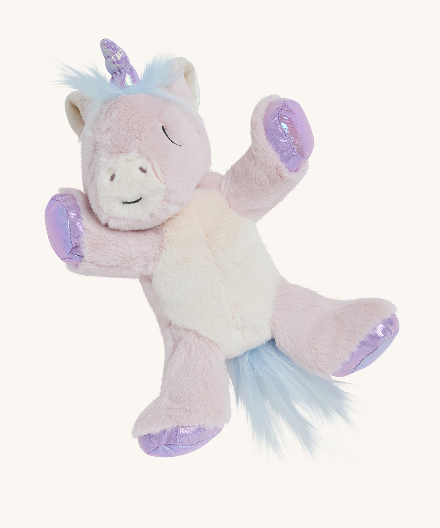 A picture of the unicorn toy on its back, so that you can see its soft belly