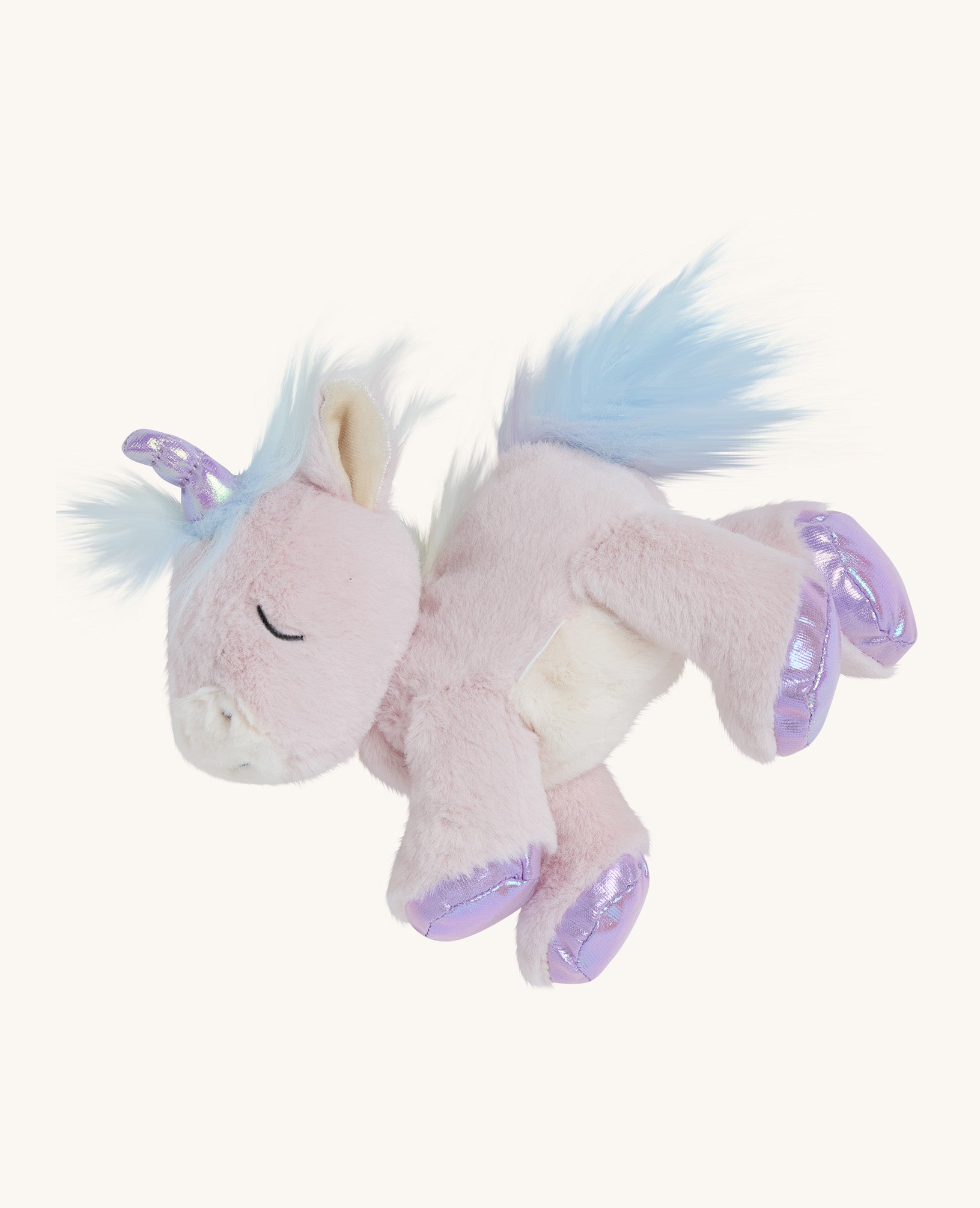 Sparkle the unicorn toy laying down