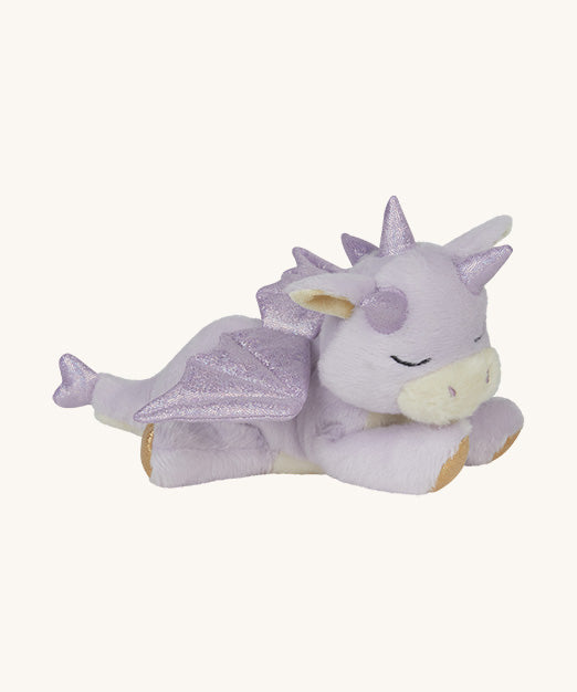 A Olli Ella binky misty dragon doll lying flat. This fluffy light purple dragon has a sleeping face,  features glittery wings, horns and available at Babipur.