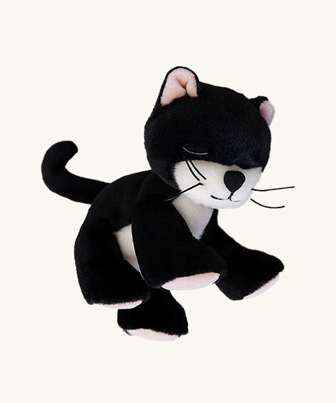 A posing Olli Ella Kit binky kitten doll available at Babipur. This kitten is black with a white front and features cute ears and whiskers. 