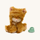 A sitting Olli Ella Koda binky kitten doll available at Babipur. This cute orange striped fluffy doll has beige paws, whiskers and comes with a green magnetic pacifier.