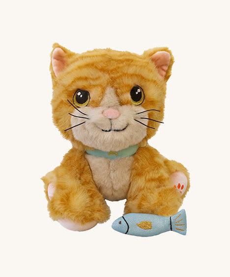 A sitting Olli Ella binx cat dinkum doll available at Babipur. This fluffy cat is orange striped and with playful facial features and comes with a blue magnetic fish.